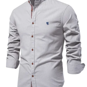 Chemise boutonnée à manches longues 100% coton de couleur unie pour hommes